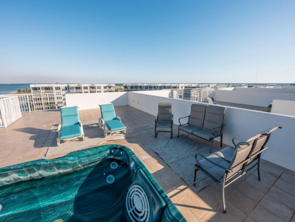 Sweeping views of Bay and Gulf from Private rooftop patio